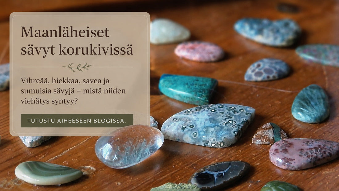 Maanläheisiä korukiviä puupöydällä.